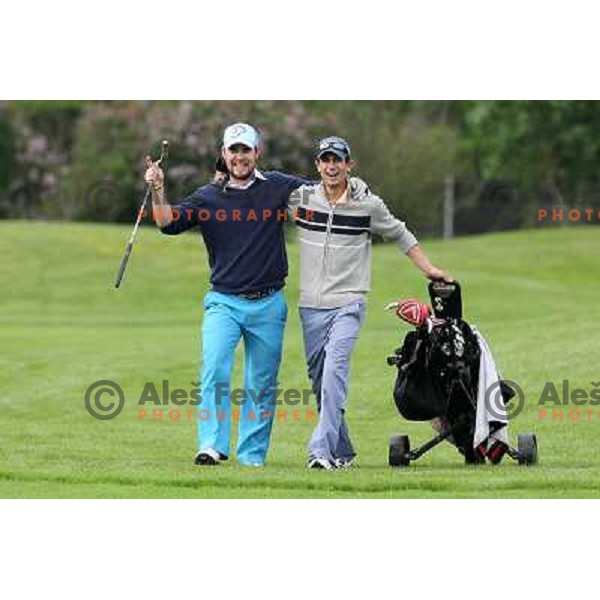 Rok Pisek with his caddie in action during Slovenian golf Open on Alps Tour at Ptuj Golf course, Slovenia 14.5.2010 
