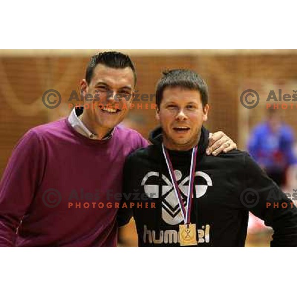 Jaka Kravanja and Uros Bregar, Krim Mercator players and fans celebrate Slovenian national handball title in Ljubljana 15.5.2010 