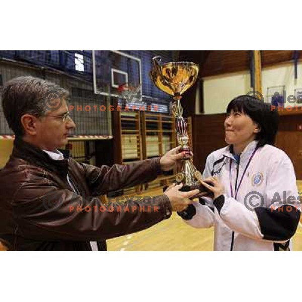 Franjo Bobinac and Liudmila Bodnieva with trophy before Krim Mercator players and fans celebrate Slovenian national handball title in Ljubljana 15.5.2010 