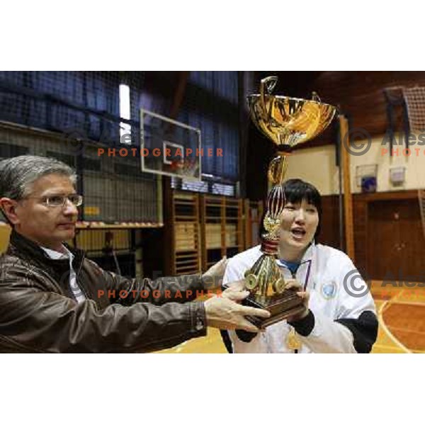 Franjo Bobinac and Liudmila Bodnieva with trophy before Krim Mercator players and fans celebrate Slovenian national handball title in Ljubljana 15.5.2010 