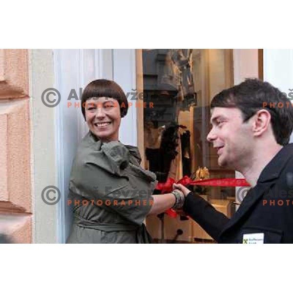  Fashion designer Ivona Martinko and snowboarder Rok Flander during grand opening in their fashion boutique in Ljubljana, Slovenia 20.5.2010 