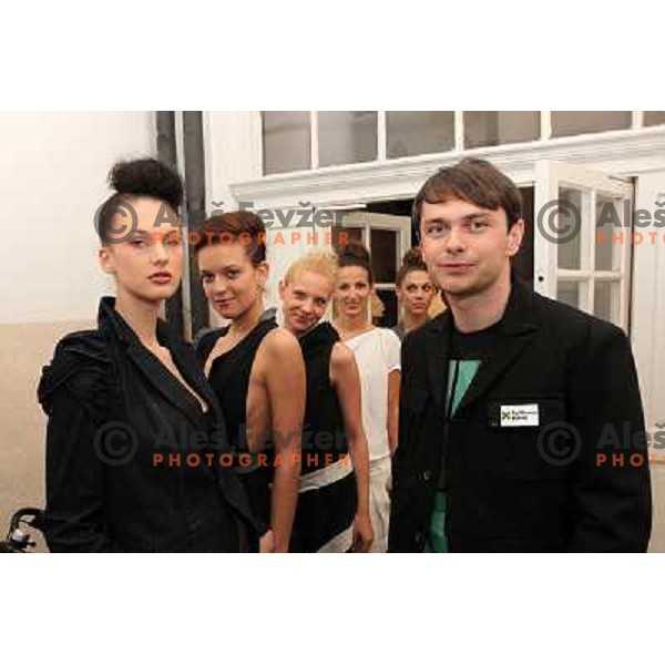 snowboarder Rok Flander with models during grand opening of fashion boutique Flander-Martinko in Ljubljana, Slovenia 20.5.2010 
