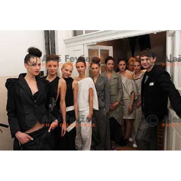 snowboarder Rok Flander with models during grand opening of fashion boutique Flander-Martinko in Ljubljana, Slovenia 20.5.2010 