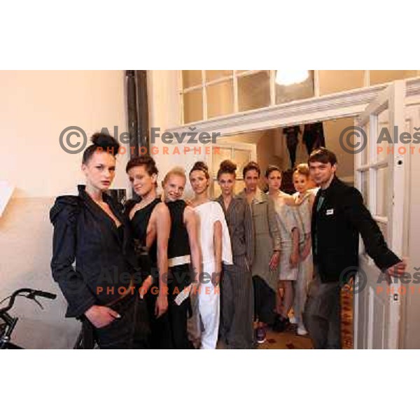 snowboarder Rok Flander with models during grand opening of fashion boutique Flander-Martinko in Ljubljana, Slovenia 20.5.2010 