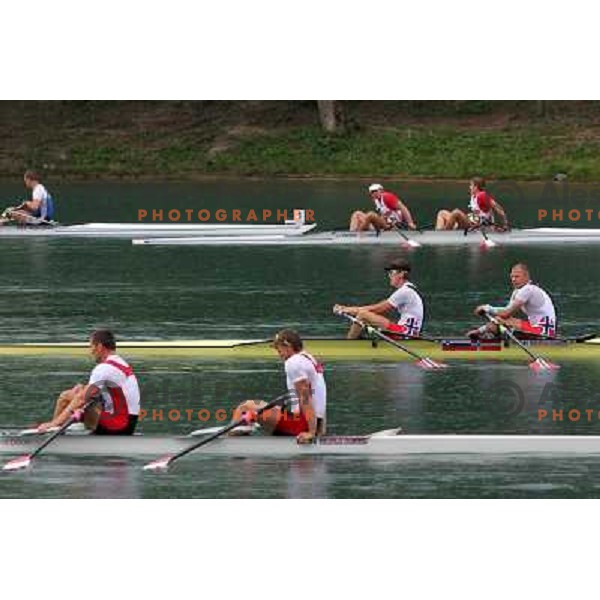 Olaf Tufte (NOR) and Iztok Cop (SLO) rowing for Norway action during Rowing World Cup, Bled, Slovenia 29.5.2010 