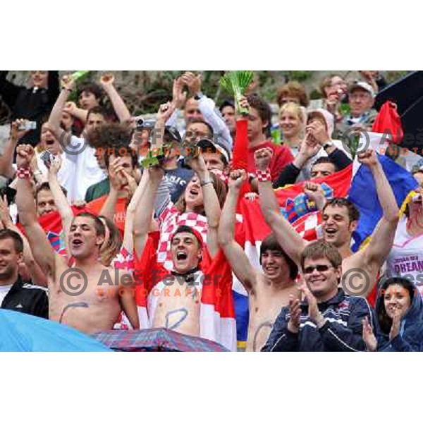 Croatian fans celebrate victory of their double four during rowing world cup, lake Bled, Slovenia 30.5.2010 