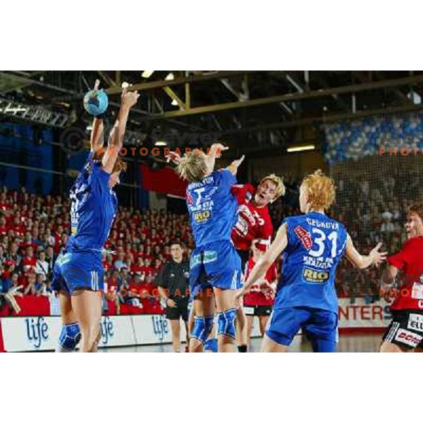 Olga Ceckova, Tanja Tomanovic,Marina Vergelyuk in action during handball match Krim Eta Malizia- Slagelse FH in Final of EHF Championsleague, played at Kodeljevo Hall, Ljubljana, Slovenia 22.5.2004. Slagelse FH won 36-32 and became a Champion 