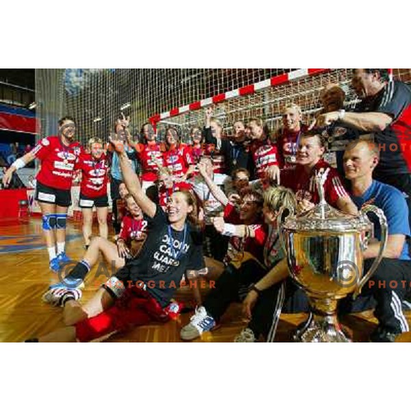 Slagelse players celebrate victory at handball match Krim Eta Malizia- Slagelse FH in Final of EHF Championsleague, played at Kodeljevo Hall, Ljubljana, Slovenia 22.5.2004. Slagelse FH won 36-32 and became a Champion 