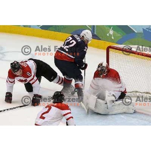 Luongo and Brown in action during ice hockey match Canada-USA in the final of Olympic tournament 28.2.2010, Vancouver 2010 Winter Olympic Games, Canada 