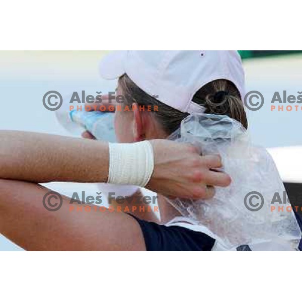 Elena Bovina of Russia putts ice on her neck during first round of Qualifying singles at WTA Banka Koper Slovenia Open tennis tournament, played in SRC Marina, Portoroz, Slovenia on July 17 2010 