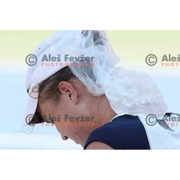 Elena Bovina of Russia putts ice on her neck during first round of Qualifying singles at WTA Banka Koper Slovenia Open tennis tournament, played in SRC Marina, Portoroz, Slovenia on July 17 2010 