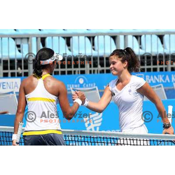 Anne Keothavong of England and Nastja Kolar of Slovenia shake hands after first round of Qualifying singles at WTA Banka Koper Slovenia Open tennis tournament, played in SRC Marina, Portoroz, Slovenia on July 17 2010 