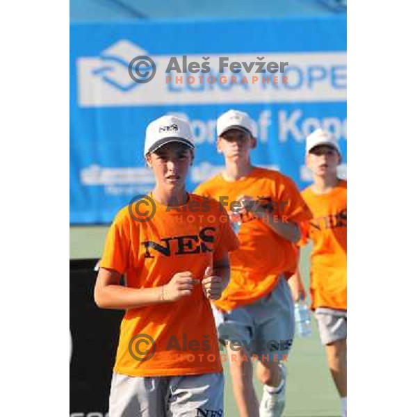 Ball boys running during second round of Qualifying singles at WTA Banka Koper Slovenia Open tennis tournament, played in SRC Marina, Portoroz, Slovenia on July 18, 2010 