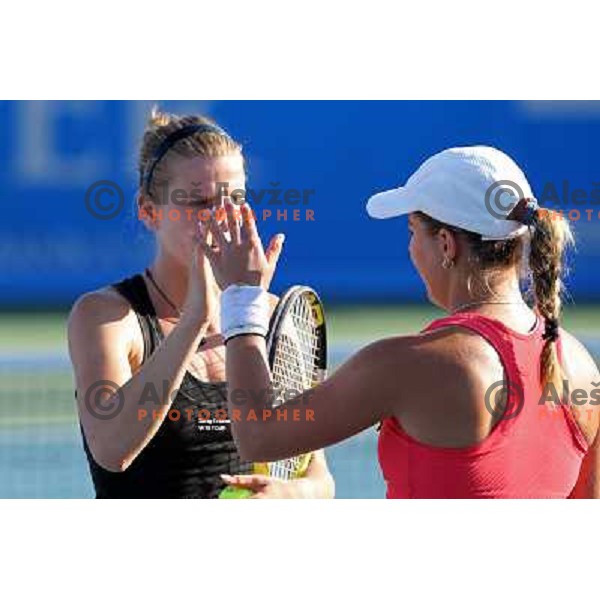 Sesil Karatantcheva of Khazakhstan and Anna Tatishvili of Georgia in action during first round of WTA Banka Koper Slovenia Open tennis tournament, played in SRC Marina, Portoroz, Slovenia on July 19, 2010 
