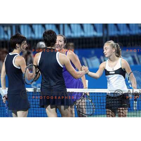 Jelena Jankovic and Aleksandra Krunic of Serbia celebrate victory in second round of the doubles at WTA Banka Koper Slovenia Open tennis tournament, played in SRC Marina, Portoroz, Slovenia on July 21, 2010 