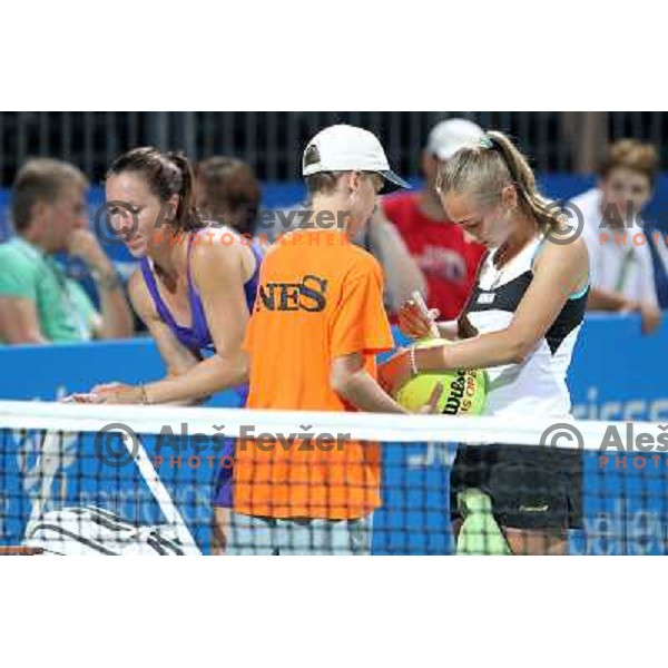 Jelena Jankovic and Aleksandra Krunic of Serbia celebrate victory in second round of the doubles at WTA Banka Koper Slovenia Open tennis tournament, played in SRC Marina, Portoroz, Slovenia on July 21, 2010 