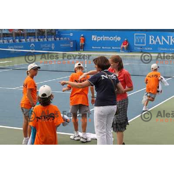 Ball boys and referees wipe the court after rain shower during the quarter-finals of WTA Banka Koper Slovenia Open tennis tournament, played in SRC Marina, Portoroz, Slovenia on July 23, 2010 