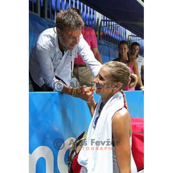 Polona Hercog of Slovenia receives congratulations from Zoran Kofol after the quarter-finals of WTA Banka Koper Slovenia Open tennis tournament, played in SRC Marina, Portoroz, Slovenia on July 23, 2010 