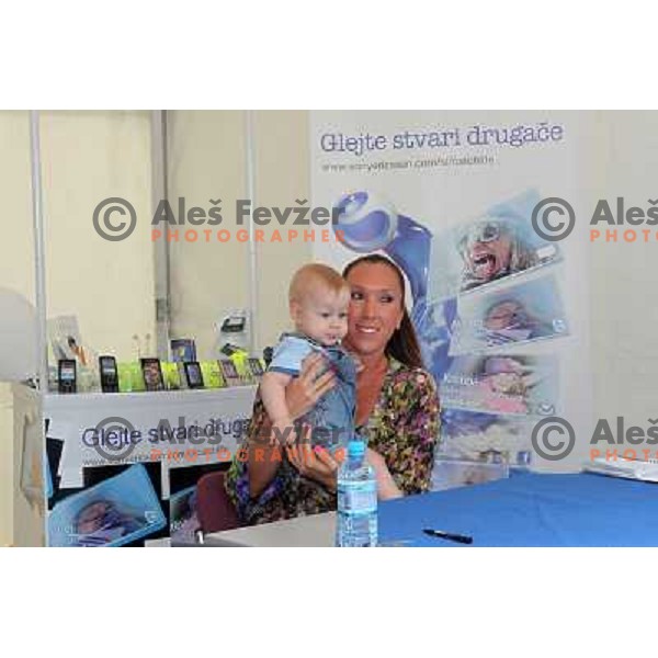 Jelana Jankovic of Serbia signs autographs during WTA Banka Koper Slovenia Open tennis tournament, played in SRC Marina, Portoroz, Slovenia on July 24, 2010 