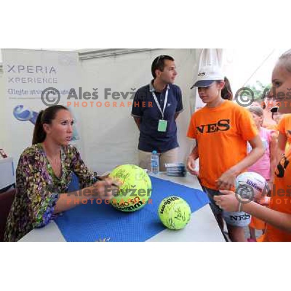 Jelana Jankovic of Serbia signs autographs during WTA Banka Koper Slovenia Open tennis tournament, played in SRC Marina, Portoroz, Slovenia on July 24, 2010 