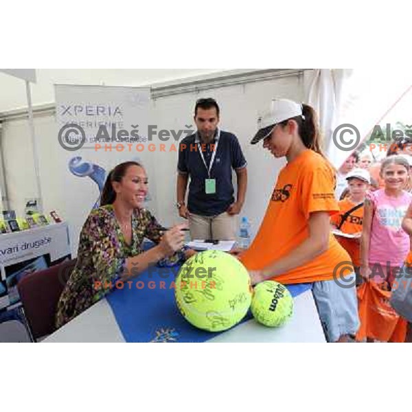 Jelana Jankovic of Serbia signs autographs during WTA Banka Koper Slovenia Open tennis tournament, played in SRC Marina, Portoroz, Slovenia on July 24, 2010 