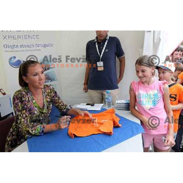 Jelana Jankovic of Serbia signs autographs during WTA Banka Koper Slovenia Open tennis tournament, played in SRC Marina, Portoroz, Slovenia on July 24, 2010 