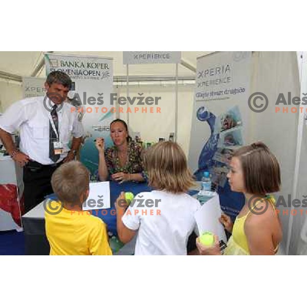 Jelana Jankovic of Serbia signs autographs during WTA Banka Koper Slovenia Open tennis tournament, played in SRC Marina, Portoroz, Slovenia on July 24, 2010 