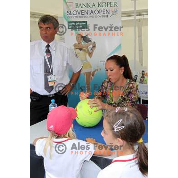 Jelana Jankovic of Serbia signs autographs during WTA Banka Koper Slovenia Open tennis tournament, played in SRC Marina, Portoroz, Slovenia on July 24, 2010 