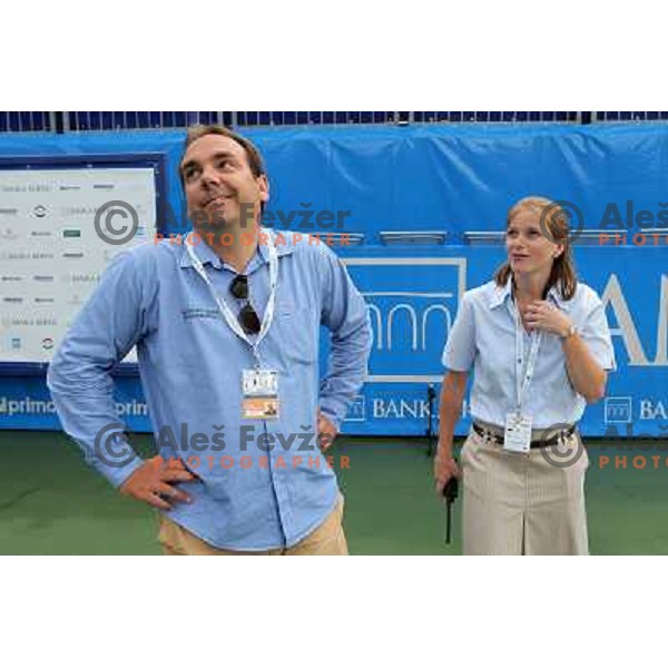 Andrej Bizjak and Melanie Tabb watch the sky before start of semi-final of WTA Banka Koper Slovenia Open tennis tournament, played in SRC Marina, Portoroz, Slovenia on July 24, 2010 