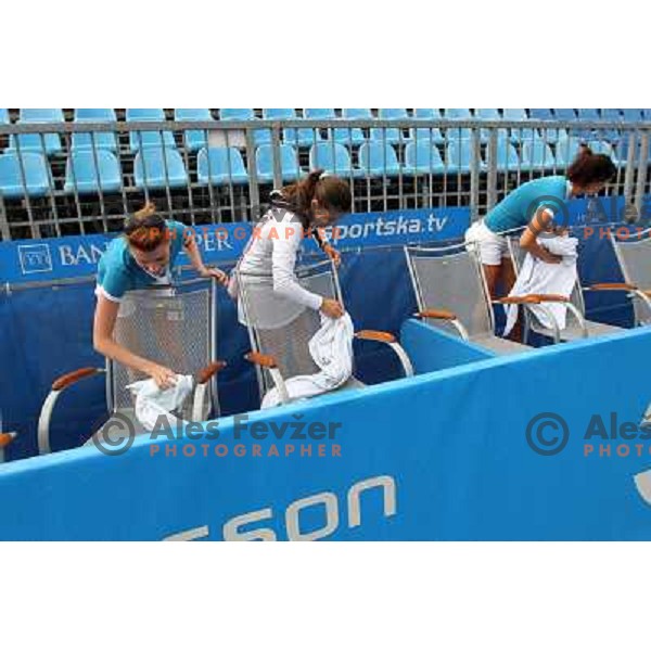 Tournament staff wipe centre court after heavy shower before start of semi-final of WTA Banka Koper Slovenia Open tennis tournament, played in SRC Marina, Portoroz, Slovenia on July 24, 2010 