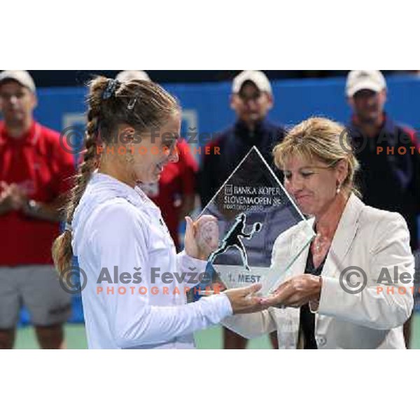 Mima Jausevec gives a trophy to Anna Chakvetadze of Russia ,winner of WTA Banka Koper Slovenia Open tennis tournament, played in SRC Marina, Portoroz, Slovenia on July 25, 2010 