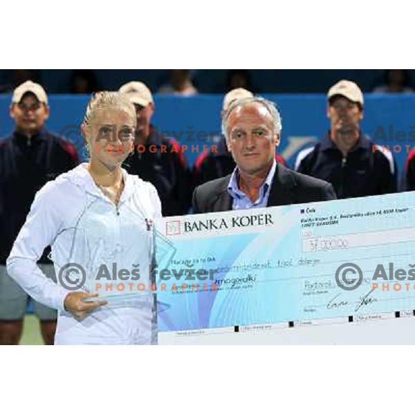 Enzo Savai gives a cheque to Anna Chakvetadze of Russia ,winner of WTA Banka Koper Slovenia Open tennis tournament, played in SRC Marina, Portoroz, Slovenia on July 25, 2010 