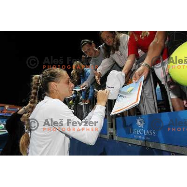 Anna Chakvetadze of Russia signs autographs after the final of WTA Banka Koper Slovenia Open tennis tournament, played in SRC Marina, Portoroz, Slovenia on July 25, 2010 