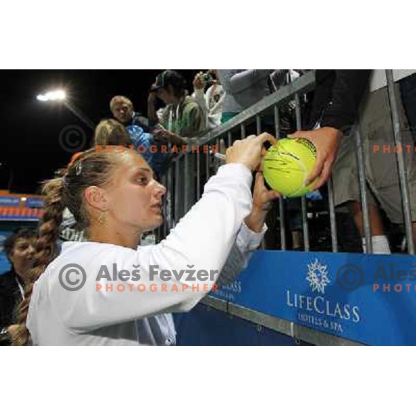 Anna Chakvetadze of Russia signs autographs after the final of WTA Banka Koper Slovenia Open tennis tournament, played in SRC Marina, Portoroz, Slovenia on July 25, 2010 