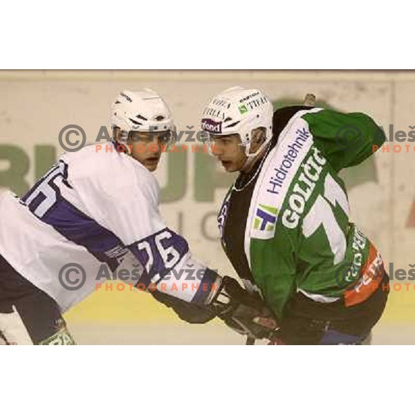 Rok Jakopic of Medvescak and Bostjan Golicic of Tilia Olimpija in action during preseason friendly ice-hockey match Tilia Olimpija- Medvescak, played in Hala Tivoli, Ljubljana, Slovenia on August 25, 2010 