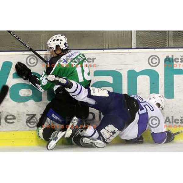 JUre Kralj of Tilia Olimpija and Chris Powers of Medvescak in action during preseason friendly ice-hockey match Tilia Olimpija- Medvescak, played in Hala Tivoli, Ljubljana, Slovenia on August 25, 2010 