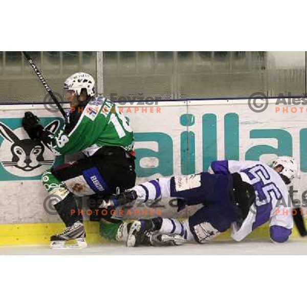  JUre Kralj of Tilia Olimpija and Chris Powers of Medvescak in action during preseason friendly ice-hockey match Tilia Olimpija- Medvescak, played in Hala Tivoli, Ljubljana, Slovenia on August 25, 2010 