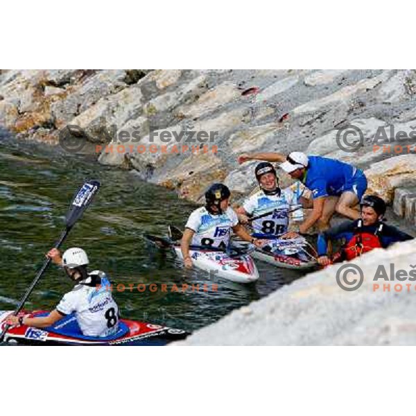 Ursa Kragelj, Eva Tercelj and Nina Mozetic accepting congratulations from Peter Kauzer after team race at world championship in Tacen, Slovenia 9.2010 