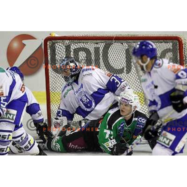 Robert Kristan, John Hughes in action during ice-hockey match Tilia Olimpija-KHL Medvescak in round 3 of EBEL league, played in Hala Tivoli, Ljubljana, Slovenia on September 17, 2010 