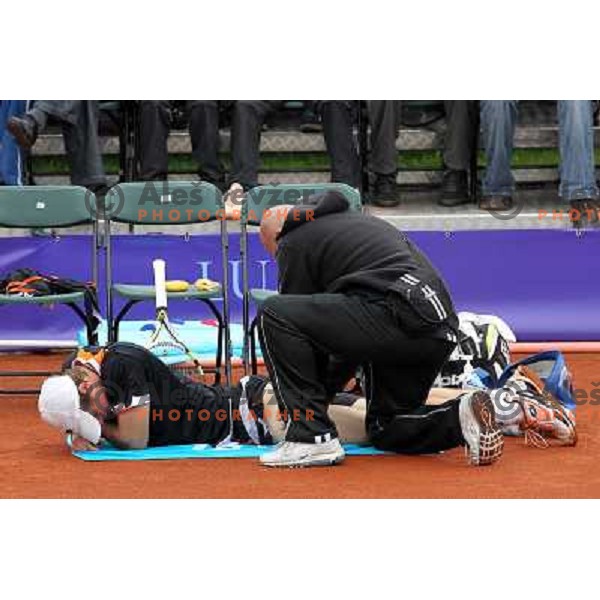 Blaz Kavcic of Slovenia gets medical treatment during Final of BMW Ljubljana Open, ATP Challenger Tour, played in SC Ljubljana on September 26, 2010 