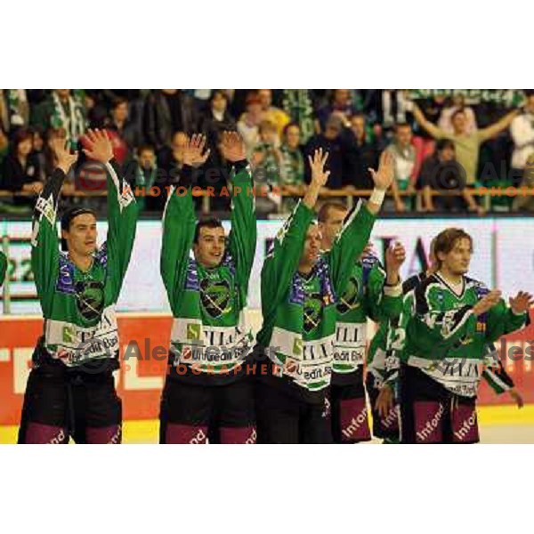 Ziga Pavlin, Igor Cvetek, Anze Ropret of Tilia Olimpija salute to the fans after ice-hockey match Tilia Olimpija- Acroni Jesenice in round 6 of EBEL league, played in Hala Tivoli, Ljubljana, Slovenia on September 26, 2010 