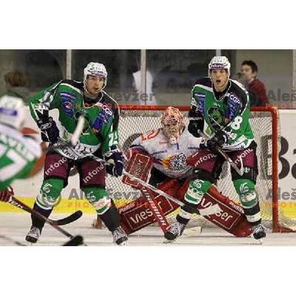 Petr Sachl, Matt Higgins of Tilia Olimpija and Jaakko Suomalainen of Acroni Jesenice in action during ice-hockey match Tilia Olimpija- Acroni Jesenice in round 6 of EBEL league, played in Hala Tivoli, Ljubljana, Slovenia on September 26, 2010 