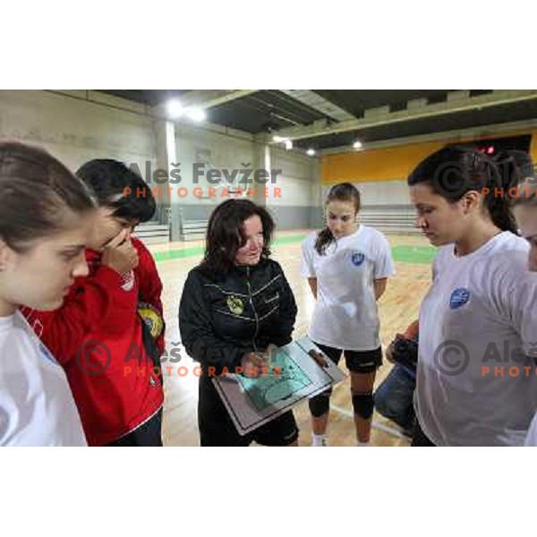Marta Bon and players of RK Krim Mercator during practice session open for the press in practice court of Stozice Hall, Ljubljana, Slovenia on October 8, 2010 