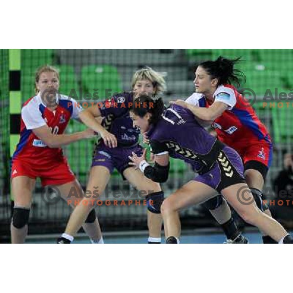 Andrea Lekic of Krim Mercator and Postnova of Zvezda in action during handball match Krim Mercator- Zvezda Zvenigorod in round 2 of EHF Champions league, played in SRC Stozice, Ljubljana, Slovenia on October 16,2010 