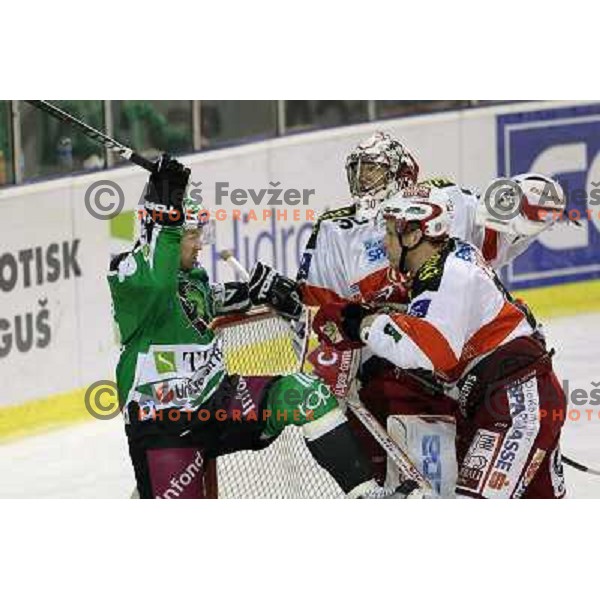 Andrej Hebar of Tilia Olimpija and Furey of KAC in action during ice-hckey match Tilia Olimpija-KAC in round 12 of EBEL league, played in Hala Tivoli,Ljubljana on October 17,2010 