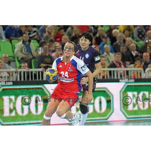 Liudmila Bodnieva of Krim Mercator and Vinogradova of Zvezda in action during handball match Krim Mercator- Zvezda Zvenigorod in round 2 of EHF Champions league, played in SRC Stozice, Ljubljana, Slovenia on October 16,2010 
