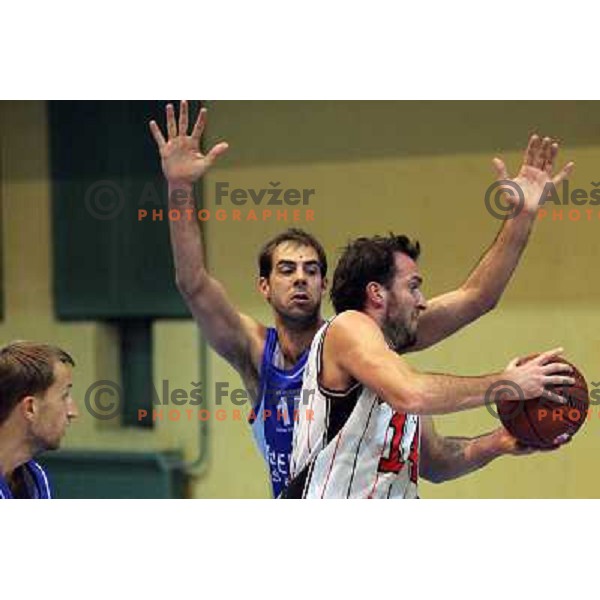 Jure Erzen of Parklji and Milos Miljkovic of Elektra Sosatanj in action during basketball match Parklji-Elektra Sostanj in third round of Telemach league, played in SRC Jezica on October 29,2010 