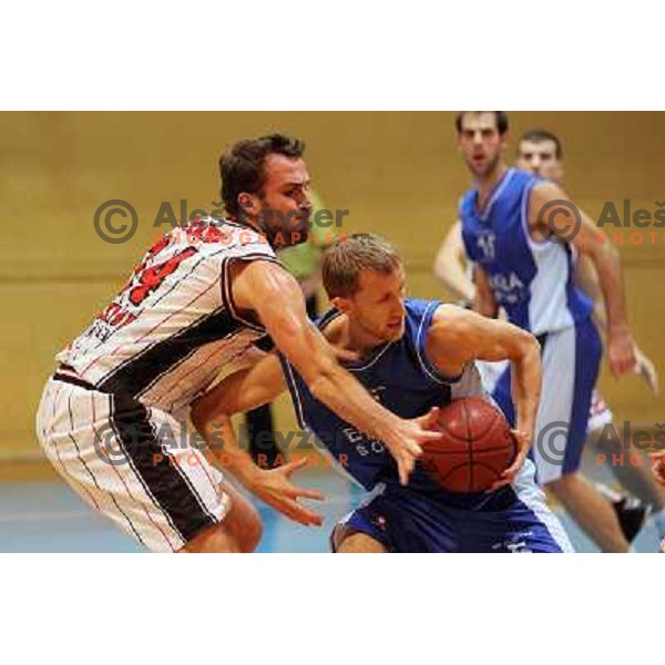 Jure Erzen of Parklji and Tadej Horvat of Elektra Sosatanj in action during basketball match Parklji-Elektra Sostanj in third round of Telemach league, played in SRC Jezica on October 29,2010 