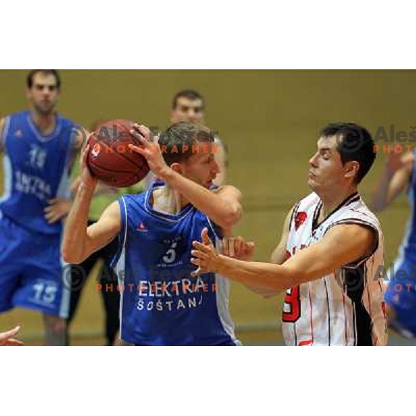 Dario Krejic of Parklji and Tadej Horvat of Elektra Sosatanj in action during basketball match Parklji-Elektra Sostanj in third round of Telemach league, played in SRC Jezica on October 29,2010 