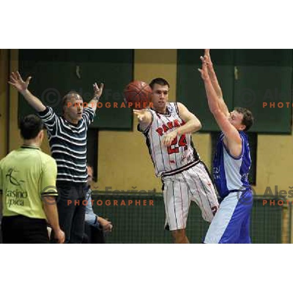 Matej Luznar of Parkljij and Dusan Hauptman, Boris Jersin of Elektra Sostanj in action during basketball match Parklji-Elektra Sostanj in third round of Telemach league, played in SRC Jezica on October 29,2010 